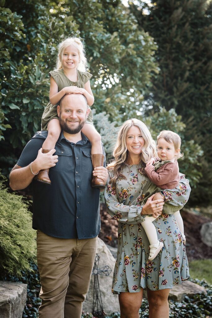 individual family captured during extended family session in family's backyard