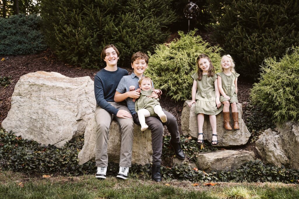 the grandkids captured during extended family portrait captured in family's backyard