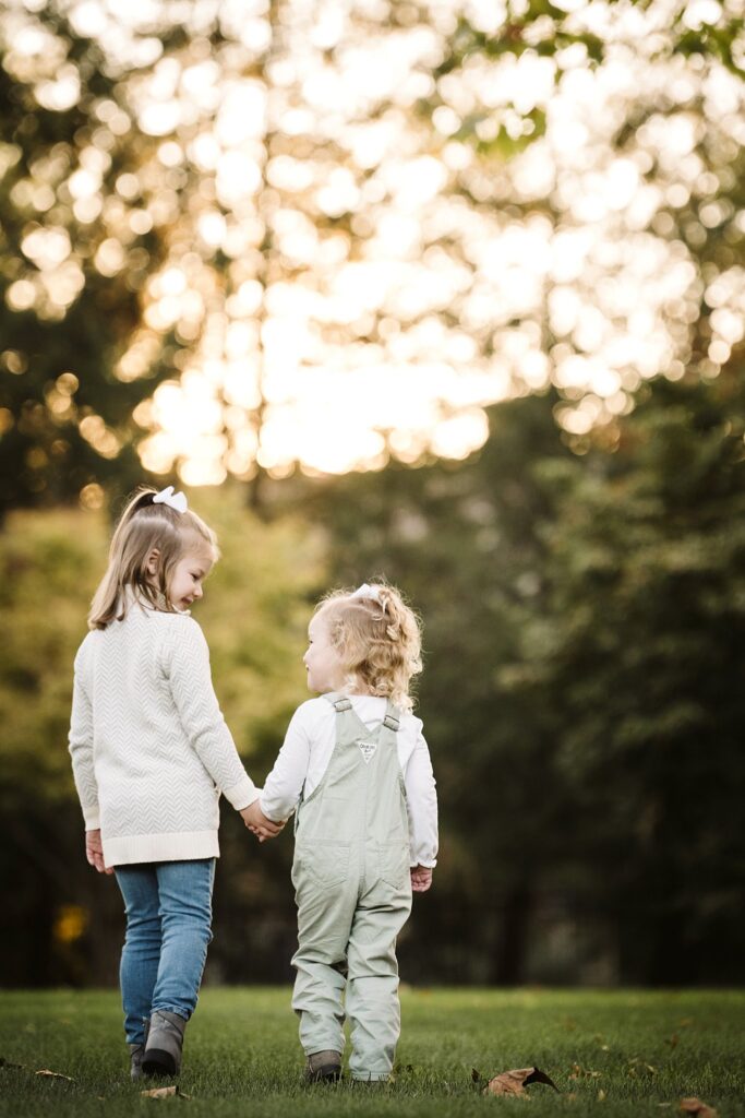 portrait of sisters at sunset