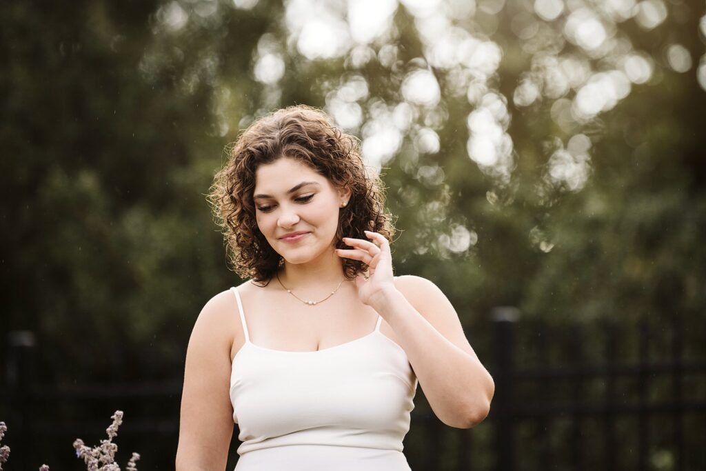 portrait of a high school senior girl during her senior photo session