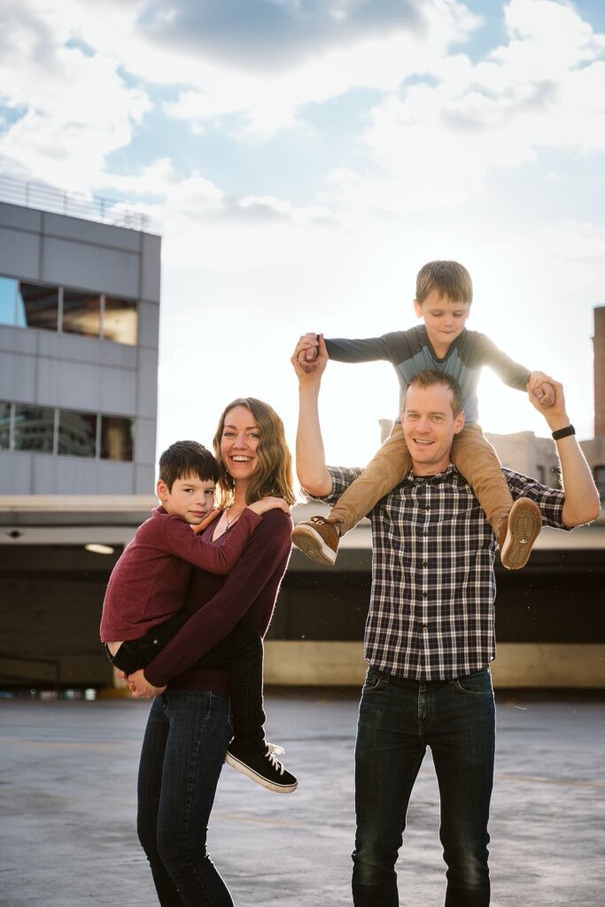 family playing together for photoshoot in Pittsburgh
