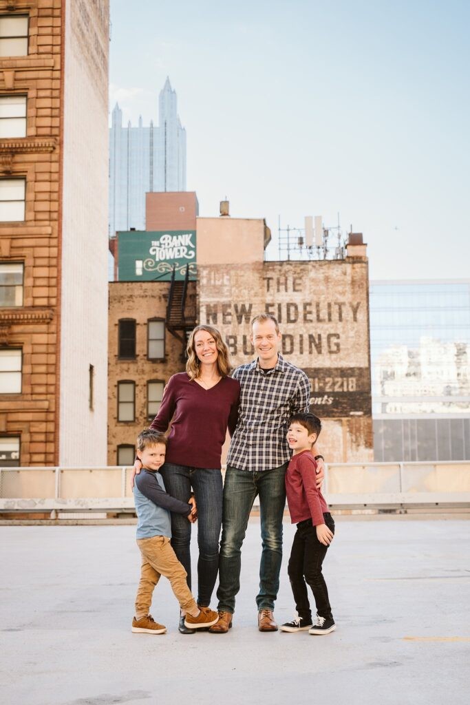 family close together for photoshoot in Pittsburgh