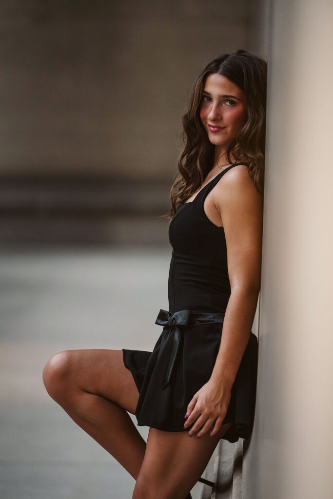 senior girl at Mellon Institute during golden hour