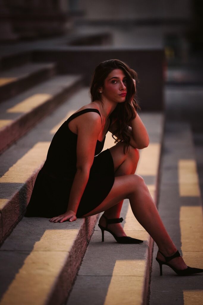 senior girl at Mellon Institute at night
