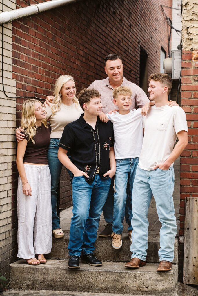 portrait of family standing on steps in Mt. Lebanon