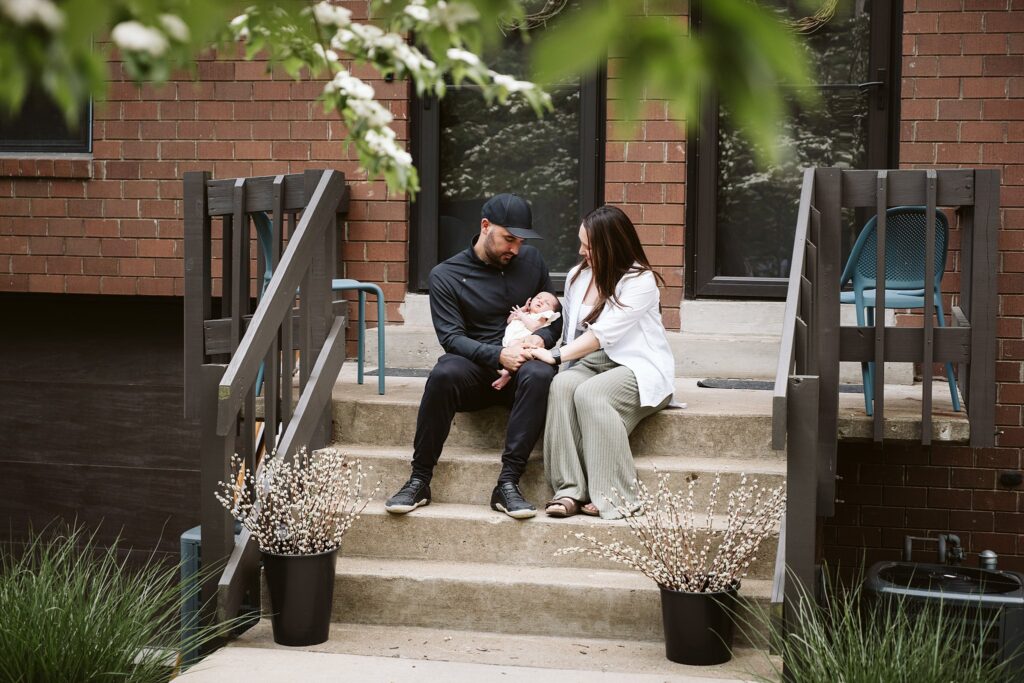 newborn lifestyle photos of family outside home in pittsburgh