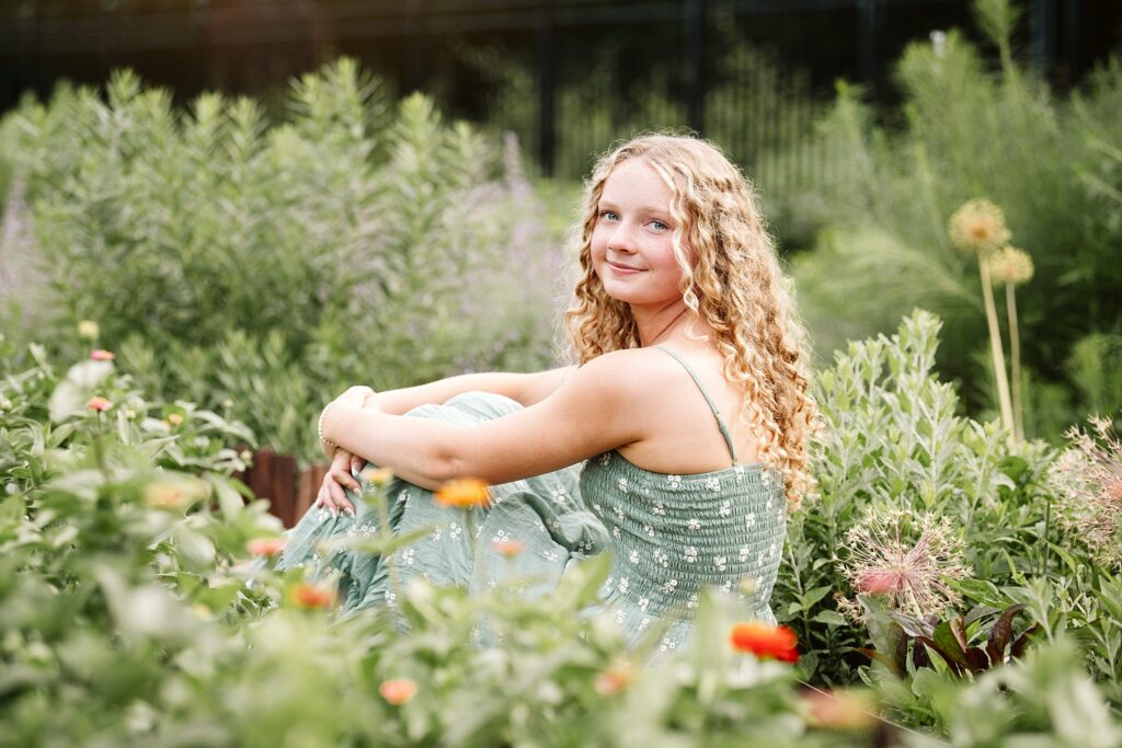 senior girl in flower garden