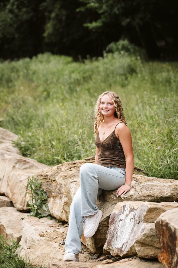 senior girl in green field