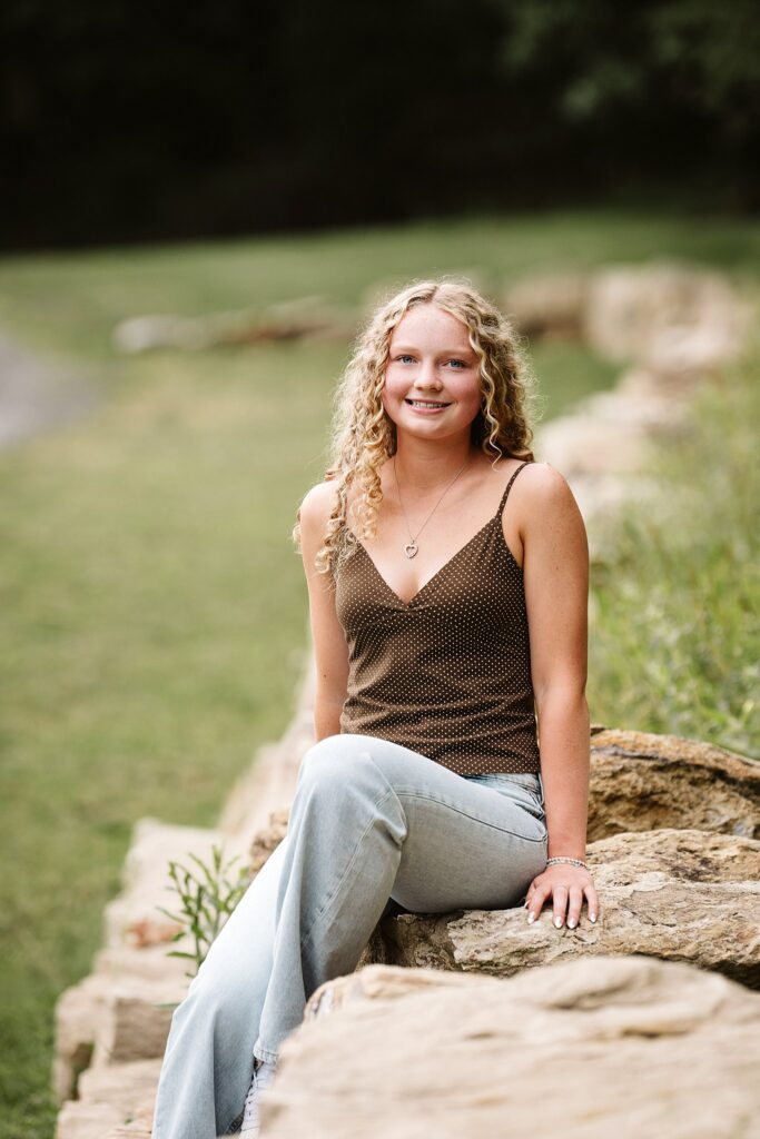 senior girl in green field