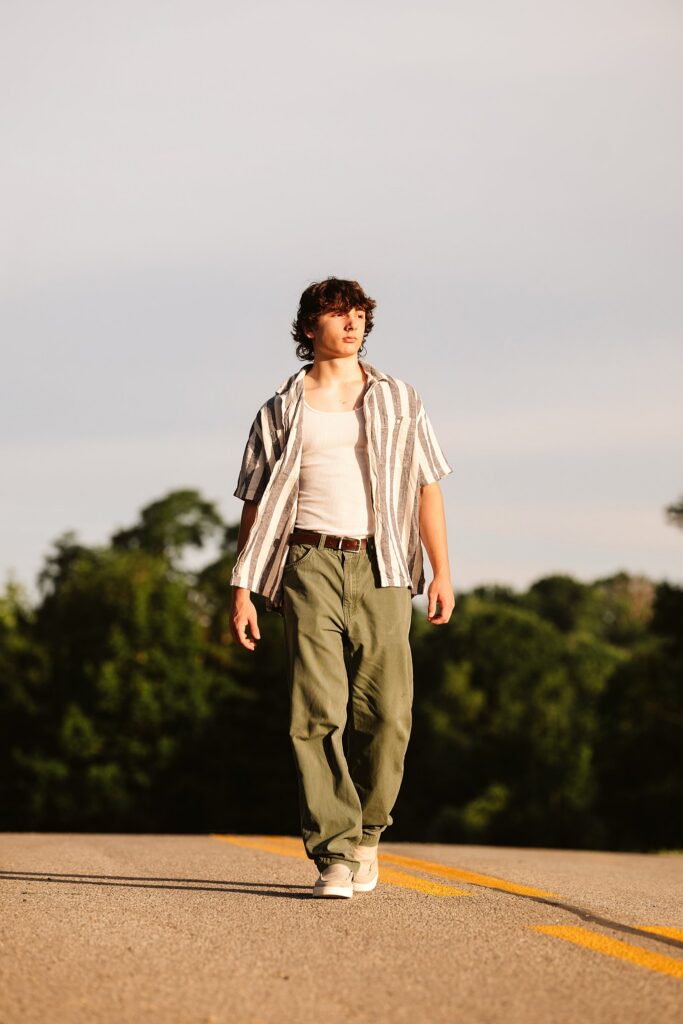 senior guy portraits at golden hour in rural setting
