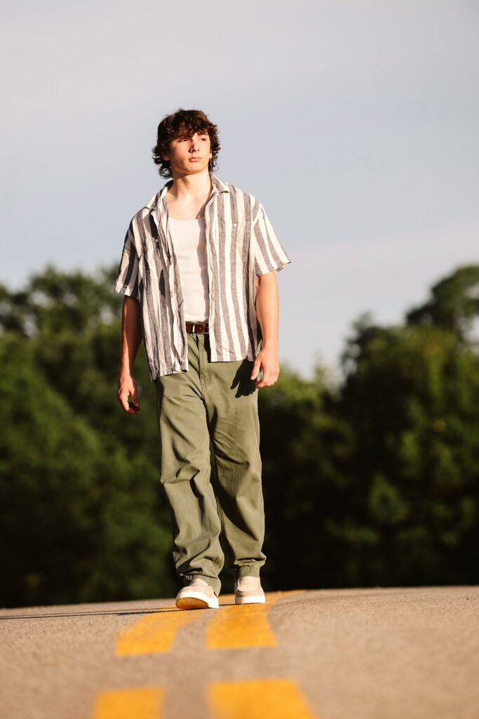 senior guy portraits at golden hour in rural setting