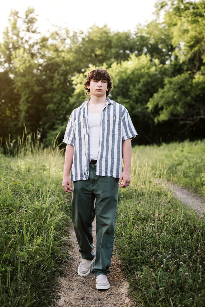 senior guy portraits at golden hour in rural setting