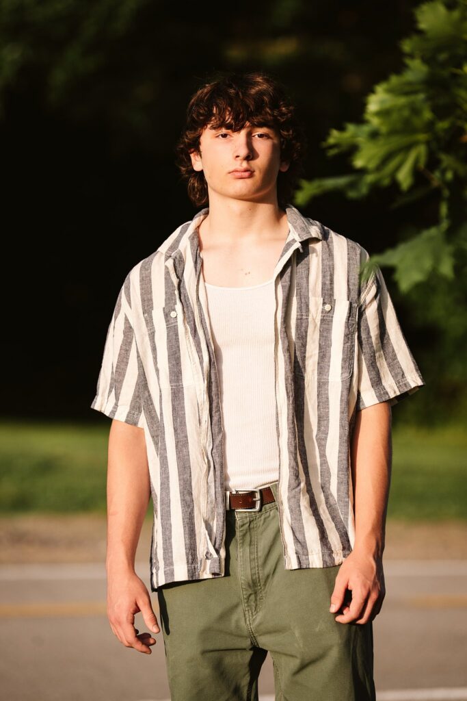 senior guy portraits at golden hour in rural setting