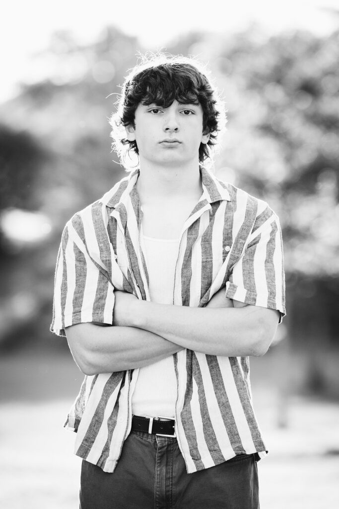 senior guy portraits at golden hour in rural setting