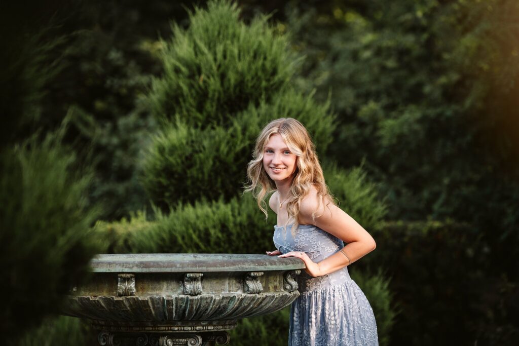 senior portrait of girl in garden near pittsburgh