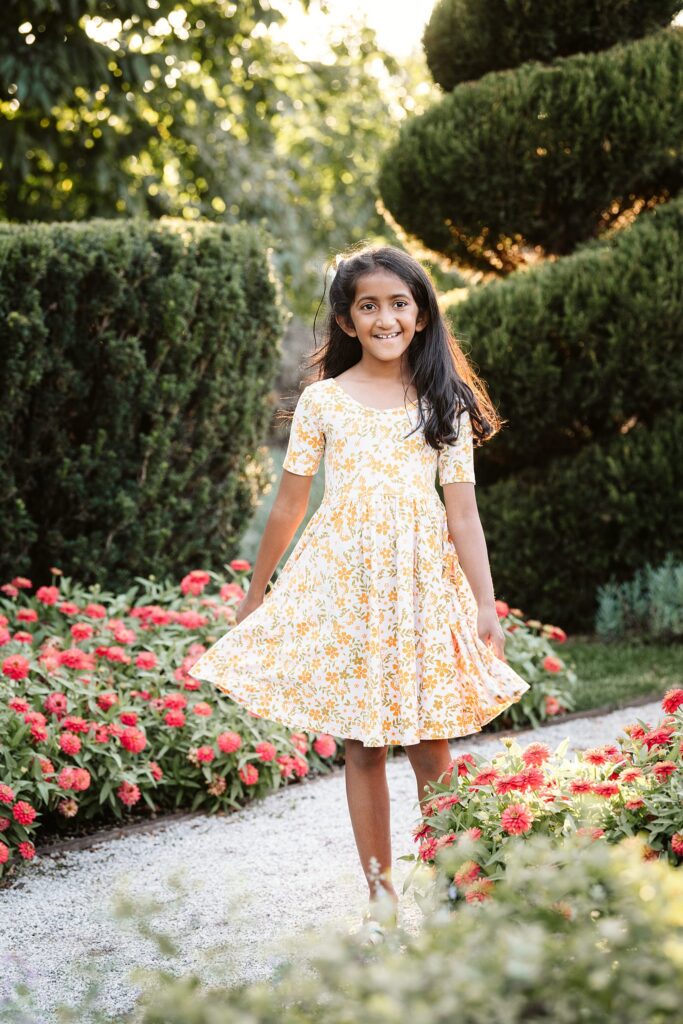 girl posing in a garden