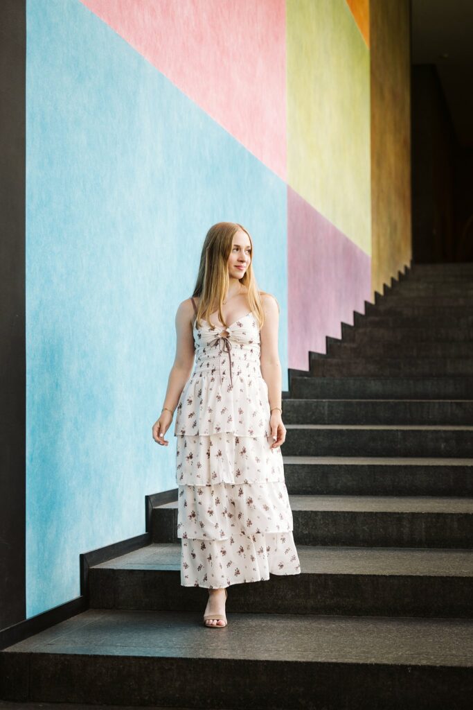 Carnegie Museum of Art senior portrait of girl walking down main stairway