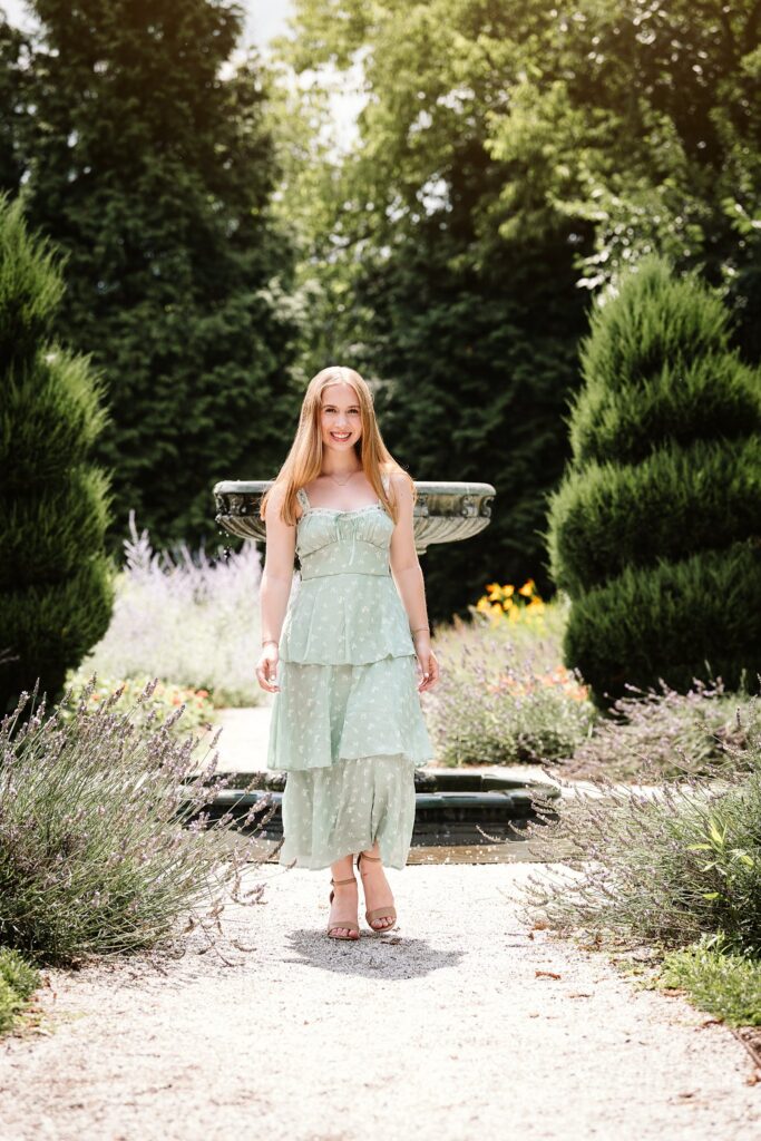 Garden with flowers and architecture senior portraits