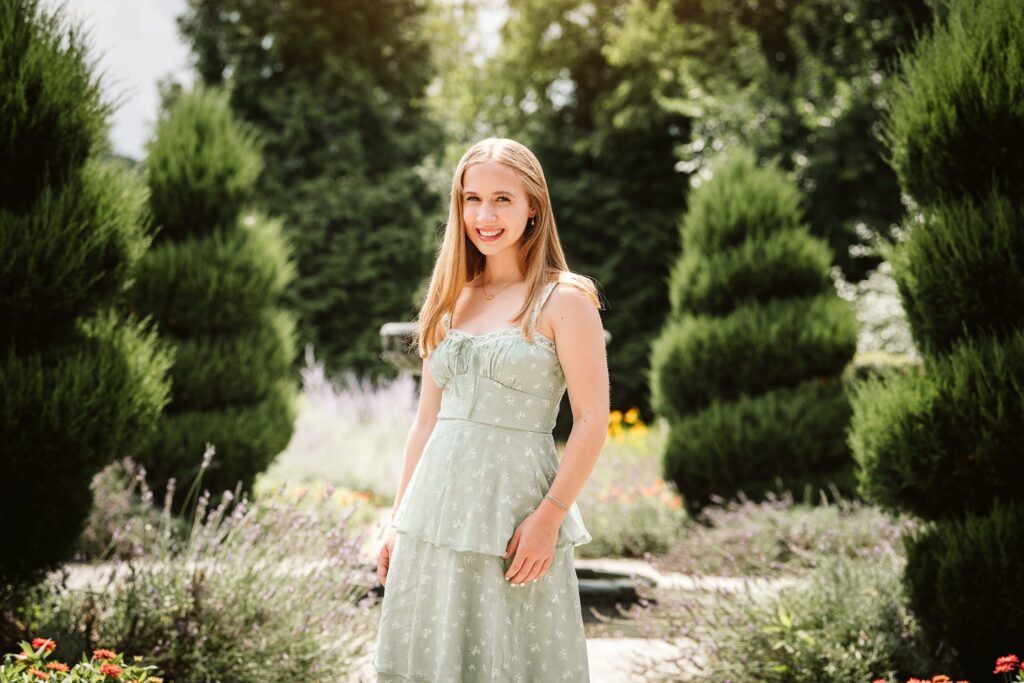 Garden with flowers and architecture senior portraits