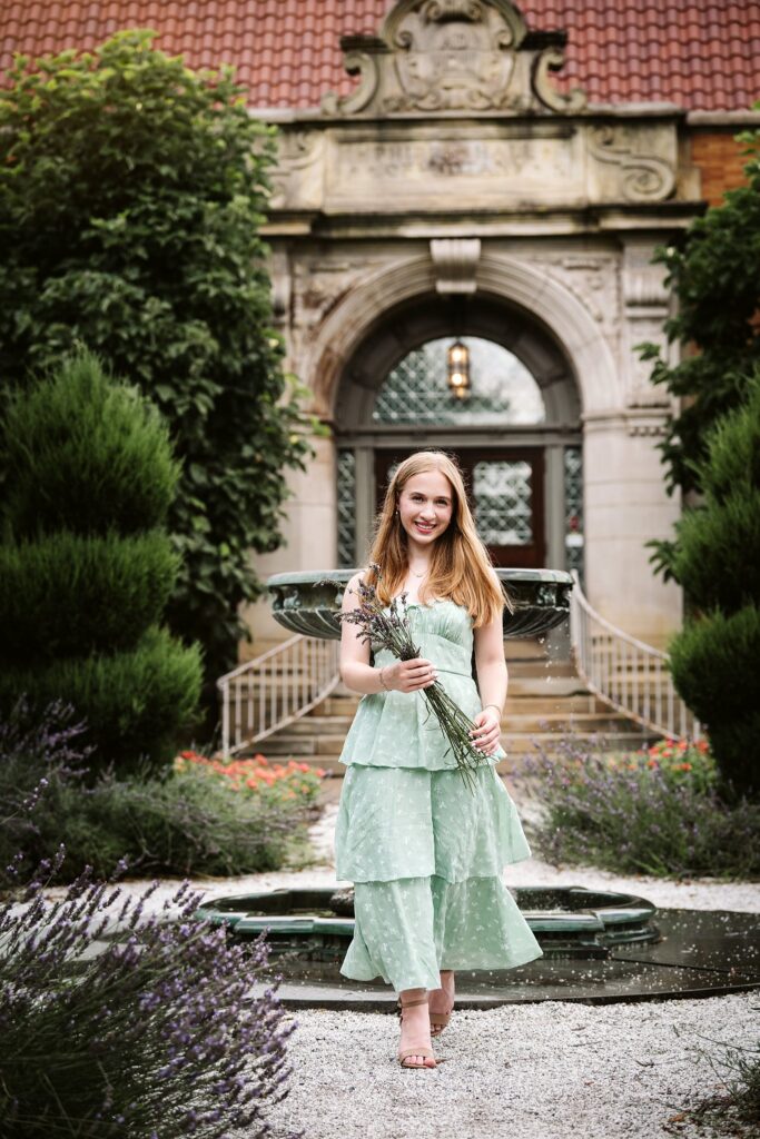 Garden with flowers and architecture senior portraits